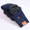 SHAN BAO Hiver Marque Fit Droite Polaire Épais Chaud Jeans Classique Badge Jeunes Hommes D'affaires Casual Taille Haute Denim Jeans 211104