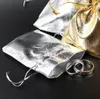 Cadeau cadeau 50 pcs / lot trois tailles de haute qualité or argent cordon organza bijoux pochette sac de mariage de Noël