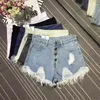 Coréia Moda Verão Mulheres Cintura Alta Botão Sexy Buraco Rippe Jean Shorts Algodão Demin solto Plus Size D212 210512