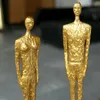 Wanduhren, ABSTRAKTE GOLDENE MÄNNLICHE UND WEIBLICHE METALLFIGUREN, STATUE-VERZIERUNGEN, SKULPTUR AUS WEISSEM MARMOR, KUNSTDEKOR FÜR ZUHAUSE, WOHNZIMMER, BÜRO