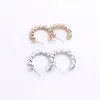 New fashion Symmetrical earrings Twist studs wholesale Gold color earrings for women