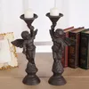 Titulares de vela Ferro de ferro forjado Suporte Europeu Angel Antique Retro Retro Decoração Decoração Mesa Centerpieces Kandelaar Acessórios da Sala AH50CH