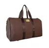 2021 Nya mode män kvinnor resväska duffelväska, märke designer bagage handväskor stor kapacitet sportväska 55cm m41414
