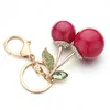 Porte-clés en cristal strass pour femmes, pendentif de sac, cerise rouge, dessin animé mignon pour voiture, porte-anneau, bijoux