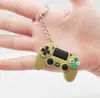 Nyckelring för män och kvinnor Tecknad Gamepad Modell Nyckelring PVC Flexibelt limmaterial Mode blandad färg Bilväska Nyckelring Charm Hänge Spänne Smycken Tillbehör