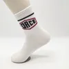 Calcetines de hombre 10 par/pack moda hombres mujeres negro blanco letras Hip Hop Simple algodón calle monopatín calcetín deportivo
