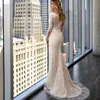 Deep V-nacke Långärmade Lace Mermaid Bröllopsklänningar med avtagbara tågapplikrade Tulle Bridal Gowns Vestidos de Novia