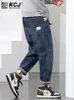 Jeans masculinos solta reta denim nove pontos casuais calças primavera e outono marca moda magro macacão