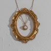 トレンディな水波鎖真珠のペンダントのステンレス鋼の金メッキ防水タートニッシュジルコンのネックレス