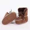 Premiers marcheurs chaud hiver en cuir véritable laine fourrure bébé garçon bottes bambin filles doux mocassins chaussures avec peluche en peau de mouton chaussons pour bébés