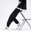 韓国のスポーツパンツメンズルースと人気のあるレギンス夏の若者の薄い薄型薄いズボンのトレンドワイドレッグ大型ストレートカジュアルズボンx0723