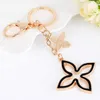 Creative Clover Keychain Gold Key حامل المفتاح المعدني سلسلة أزياء مفاتيح السحر الأسيلة هدية قلادة كاملة G10191475444