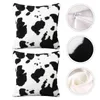 almohadas con estampado de vacas