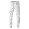 Jeans bianchi lunghi e sottili alla moda Desiger Pantaloni Demin con foro strappato patchworl di alta qualità Pantaloni streetwear per uomo