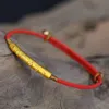 Bracelets porte-bonheur bouddhiste tibétain nœuds faits à la main fil créatif perles de cuivre irrégulières rouge noir corde tirant Bracelet pour femmes hommes