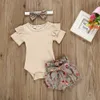 Verão 3 peças meninas de bebê 0-1 anos de idade ombro sólido bodysuit e shorts florais com conjuntos de faixa 210528
