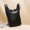 vertical leather bag