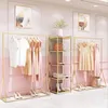 Magasin de vêtements double rangée étagères centrales meubles commerciaux type de sol présentoir de fenêtre magasins de vêtements pour enfants cintre en or