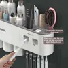 Magnetische adsorption omgekeerde tandenborstelhouder Dubbele automatische tandpasta Squeezer Dispenser Opslagrek Badkameraccessoires 211222