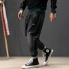 Estilo japonês fashin homens jeans vintage desenhador rasgado homme Emenda retro preto harem calças streetwear hip hop homens