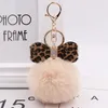 10pieces / lotto Leopard Bow Peluche Portachiavi Keychain Creativo Portachiavi Fure Ball Bag Pendente Catena Portachiavi Donna Donna