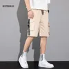 Camouflage Loose Cargo Shorts Hommes Cool Summer Militaire Camo Pantalon court Homme Cargo Shorts Pas de ceinture 210329