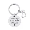 Fashion Stainless Steel Letters Nurse Cap Heart Round Keychains Key Rings Nursing is a work of hearts Silver Plated Car Keychain Jewelry Christmas Friend Gift