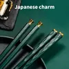 Bacchette in lega ad alta temperatura antiscivolo per uso domestico in stile giapponese per uso domestico in oro verde Famiglia con un paio di bacchette per Persona386040872