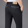 Negócio masculino de cintura alta denim terno calças na moda moda trecho solto reto jeans fino de meia idade idosos calças de marca 220311