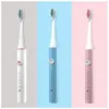 Brosse à dents électrique rechargeable USB Brosse à minuterie pour adulte IPX7 Brosses à dents réglables étanches à 5 modes avec têtes de rechange - Rose