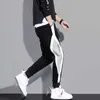 Byxor män solida elastiska midja streetwear joggare 2020 nya baggy drop-crotch byxor casual byxor man x0723