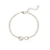 Pcs / Set Amor Coração Símbolo Infinito Charme Pulseiras Para Mulher Link De Ouro Cadeia Oca Pena Preta Grânulos Braclet Girl233l