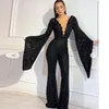 Bescheidene schwarze Jumpsuit Kleider Schaufel Hals Flare PEPADE Arabisch Dubai Abendkleid Customized Outfit Prom Kleid