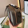 Bolso superior Bolsos de noche Cadena Crossbody Bolsos de mano de moda Bolso de mujer Lona Cuero genuino Patchwork Letra clásica Borla Colgante Cremallera Bolsos de mano