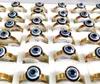 Entier 25pcs lot vintage bleu mal œil oculaire en acier inoxydable or punk ring women accessoires donn hing rinter party Unique27834657521