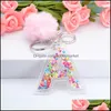 Key Rings Jewelry Letter Keychains 26 Glitter Hollowed-Out English Alphabet Car Ring Women Handbag Crafts With Puffer Ball Gift Drop Deliver