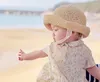2021 Baby Kinder Strohhüte Mode Schirmmütze mit Schnürung Strandhut Niedliche geizige Krempe Sonnenhüte Faltbar Atmungsaktiv Sonnenhut Fodera Sport Caps