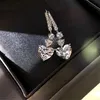 Choucong Marca Conjunto de joyería de boda Lujo Impresionante Forma de corazón Topacio blanco CZ Diamante Piedras preciosas Eternidad Cuelga Pendiente Mujer Clav238s