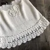 Aproms élégant fait à la main coton Crochet Mini jupes femmes été taille haute noeud papillon jupe dames plage Bikini bas Saias 210619