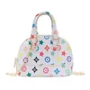 Versão coreana da bolsa mensageiro para meninas estrangeiras 2020 estampada no verão Mini Princess shell bag portátil decorativa carteira zero