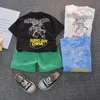 "Adorable Robot Printed Clothing Set for Kids - Trendy Summer Outfit for Boys and Girls, Includes Colorful T-shirt and Solid Shorts - Suitable for Toddlers Aged 1-4 Years"