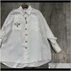 Blusar skjortor kläder kläder dropp leverans 2021 guld knapp dekoration lösa långärmade band ättiksyra vit skjorta kvinnors mode