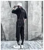 Salopette d'été Hommes Femme Bib Combinaisons Version coréenne Cravate Pieds Cool Tendance High Street Style Hip Hop Pantalon Pantalon Noir Hommes