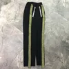 Męskie spodnie 2022 wersja Side Golden Striped Kobiety Mężczyźni Jogger Hiphop Causal Track Joggers