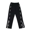 Côté à lacets taille élastique pantalon décontracté hommes haute rue surdimensionné noir Vibe pantalon de survêtement Harajuku ample Hip Hop pantalon masculin P0811