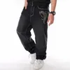Jeans hip-hop da uomo di tendenza Abbigliamento da ballo di strada Pantaloni da skateboard larghi lavati Taglie forti