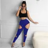 Femmes évider pantalon mode tendance couleurs unies taille moyenne maigre crayon pantalon concepteur été femme personnalité décontracté mince pantalon