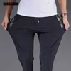 Men Pants Joggers Fitness Running Ice Silk Quick Dry Outdoor Sweatpants Slim Elasticity Trouser Breathable Plus Size 210715