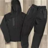 Hommes Femmes Designer Tracksuits Sweats à capuche Jacket + pantalons Sous-vêtements de style européen et américain Street Sportswear Couple Couple Ensembles de deux pièces pour Mens Plus Taille M-3XL