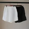 Johnature Casual Simple Women Shorts Sommar Solid Färg Elastisk Midja Lösa Bekväma Brett Ben Shorts 210521